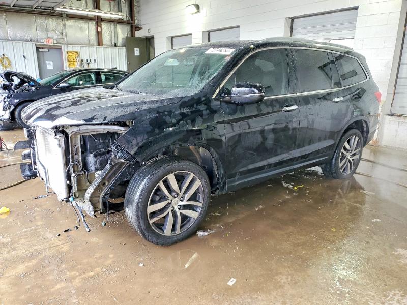 HONDA PILOT ELIT 2017 with VIN 5FNYF6H08HB034628 - Photo from auction