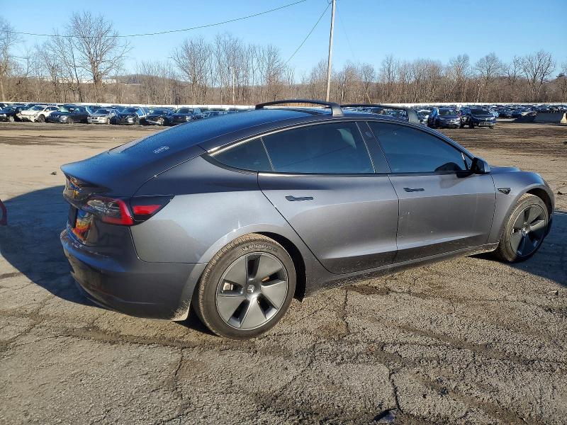 Photo 3 from auction – 2021 TESLA MODEL 3 with VIN 5YJ3E1EA9MF099673