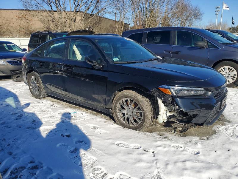 Photo 4 from auction – 2022 HONDA CIVIC SPOR with VIN 2HGFE2F55NH599508