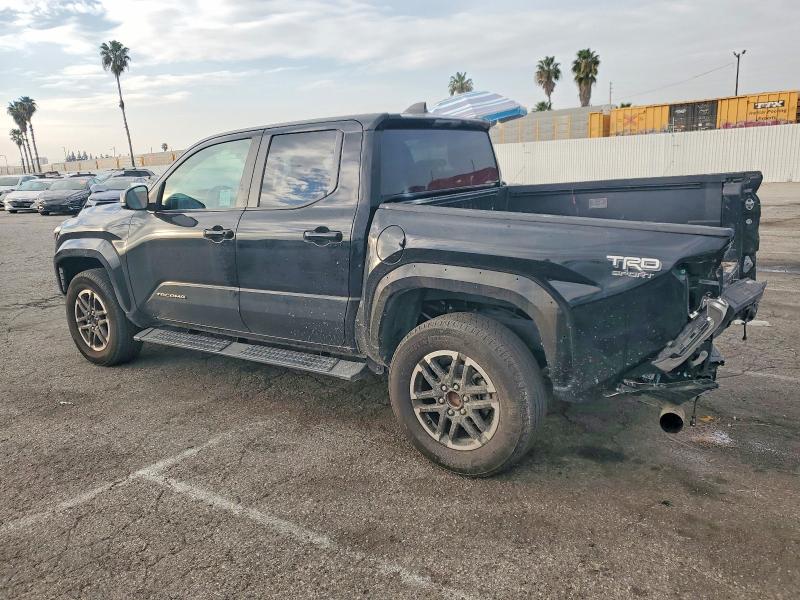 Photo 2 from auction – 2024 TOYOTA TACOMA with VIN 3TMLB5JNXRM040238
