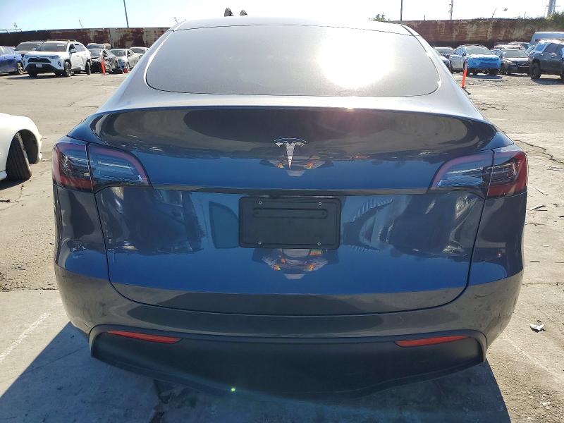 Photo 6 from auction – 2023 TESLA MODEL Y with VIN 7SAYGDED6PF963470