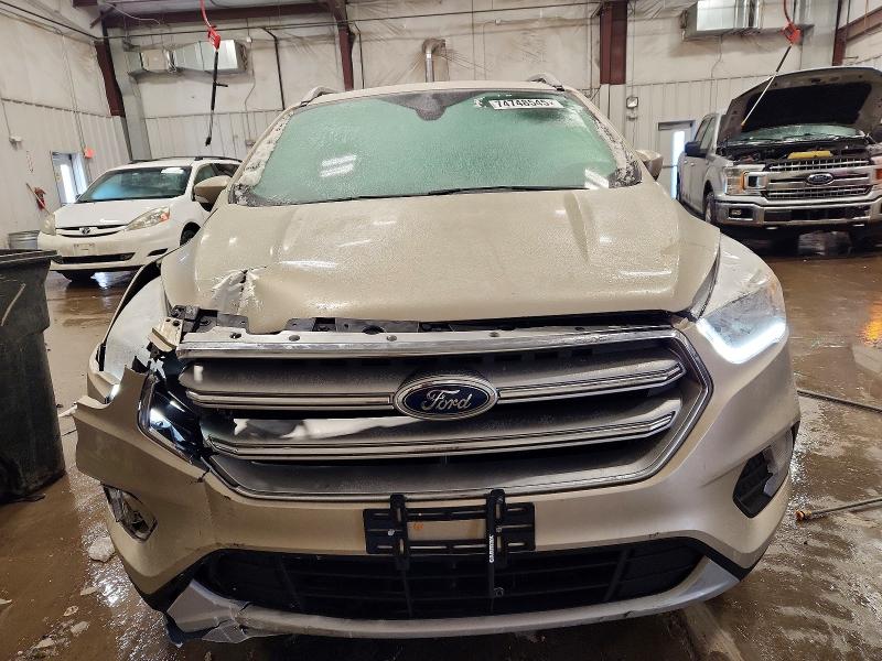 Photo 5 from auction – 2017 FORD ESCAPE TIT with VIN 1FMCU0JD9HUD65263