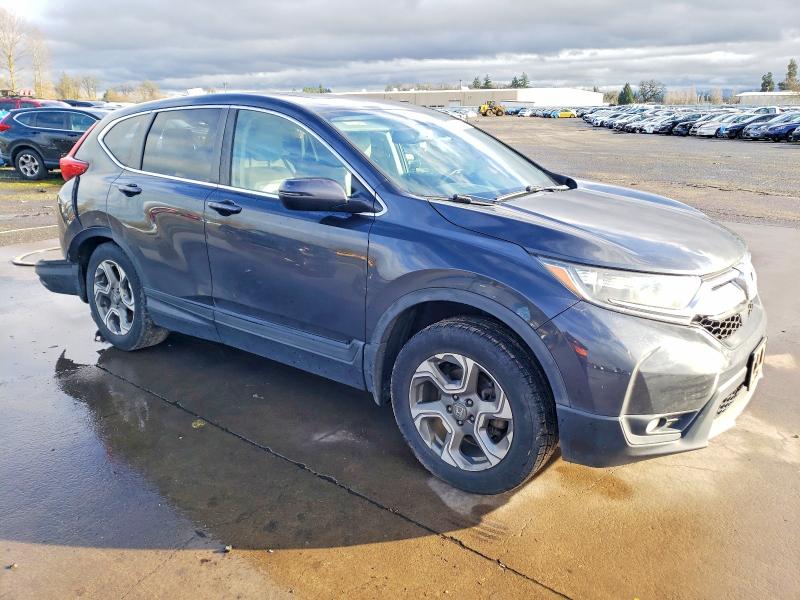 Photo 4 from auction – 2018 HONDA CR-V EXL with VIN 2HKRW2H89JH656827