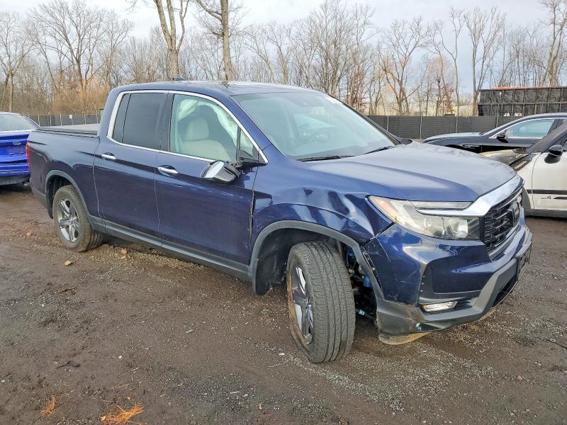 Photo 4 from auction – 2022 HONDA RIDGELINE with VIN 5FPYK3F72NB027252