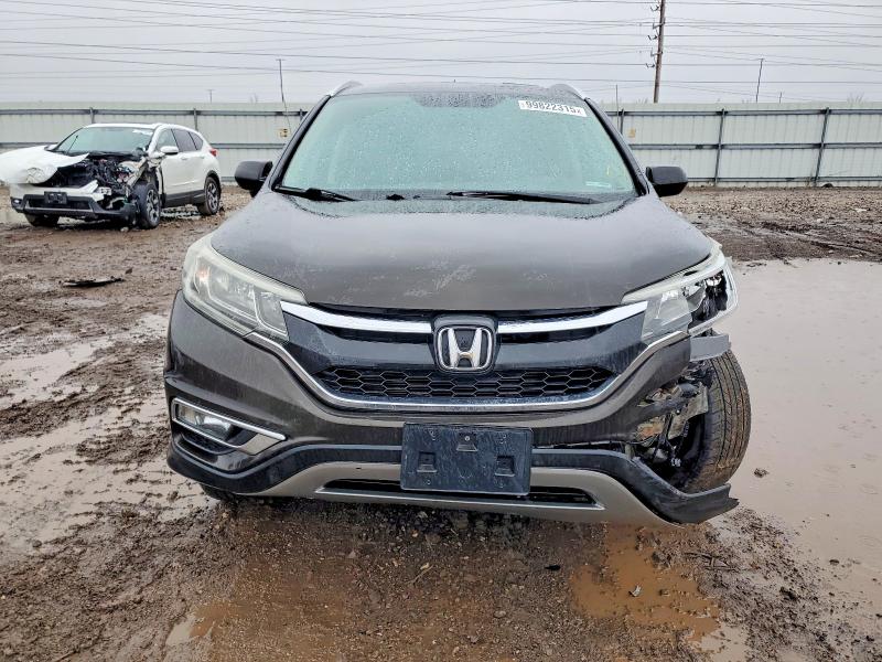 Photo 5 from auction – 2015 HONDA CR-V EXL with VIN 5J6RM4H77FL040646