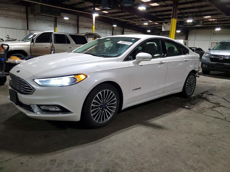 FORD FUSION TIT 2017 with VIN 3FA6P0RU5HR384015 - Photo from auction