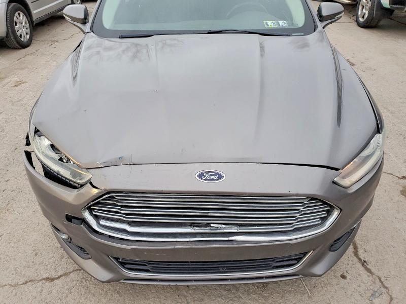 Photo 11 from auction – 2014 FORD FUSION TIT with VIN 3FA6P0K99ER147948