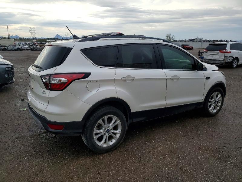 Photo 3 from auction – 2018 FORD ESCAPE SE with VIN 1FMCU0GD3JUA86193