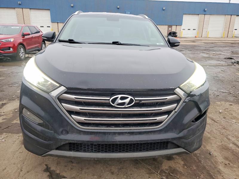 Photo 5 from auction – 2016 HYUNDAI TUCSON with VIN KM8J33A21GU038297