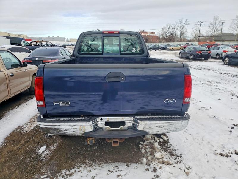 Photo 6 from auction – 2004 FORD F-150 HERI with VIN 2FTRX18W14CA27157