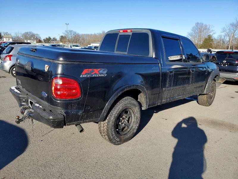 Photo 3 from auction – 2002 FORD F150 SUPER with VIN 1FTRW08L32KB51054