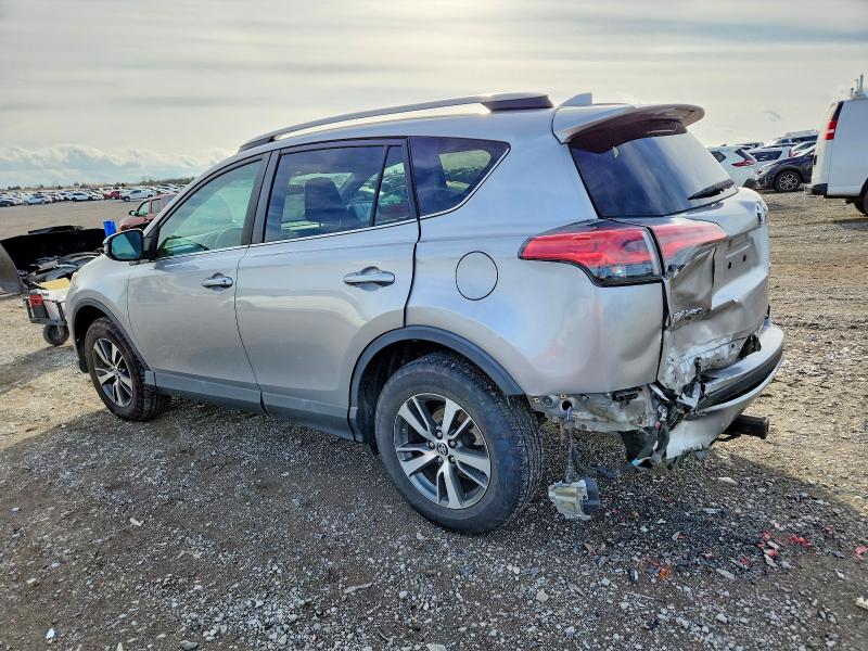 Photo 2 from auction – 2017 TOYOTA RAV4 XLE with VIN 2T3WFREV6HW393091