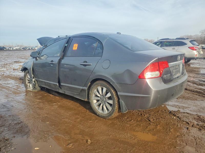 Photo 2 from auction – 2010 HONDA CIVIC with VIN 19XFA1F96AE021950