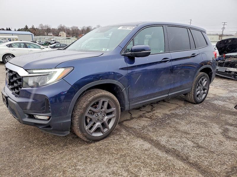 HONDA PASSPORT E 2023 with VIN 5FNYF8H54PB036270 - Photo from auction