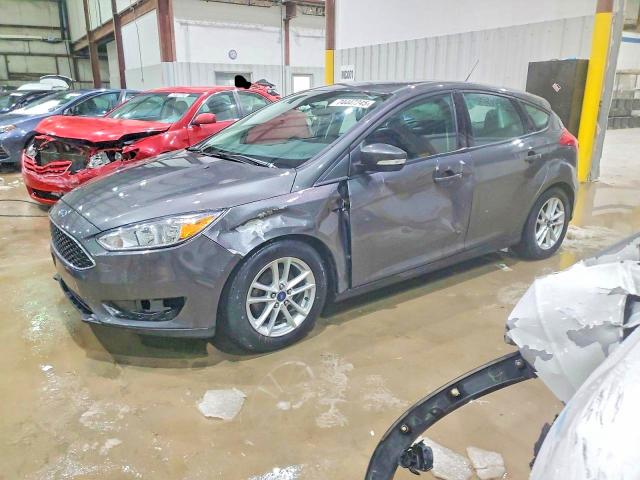 FORD FOCUS 2015 with VIN 1FADP3K2XFL383584 - Photo from auction