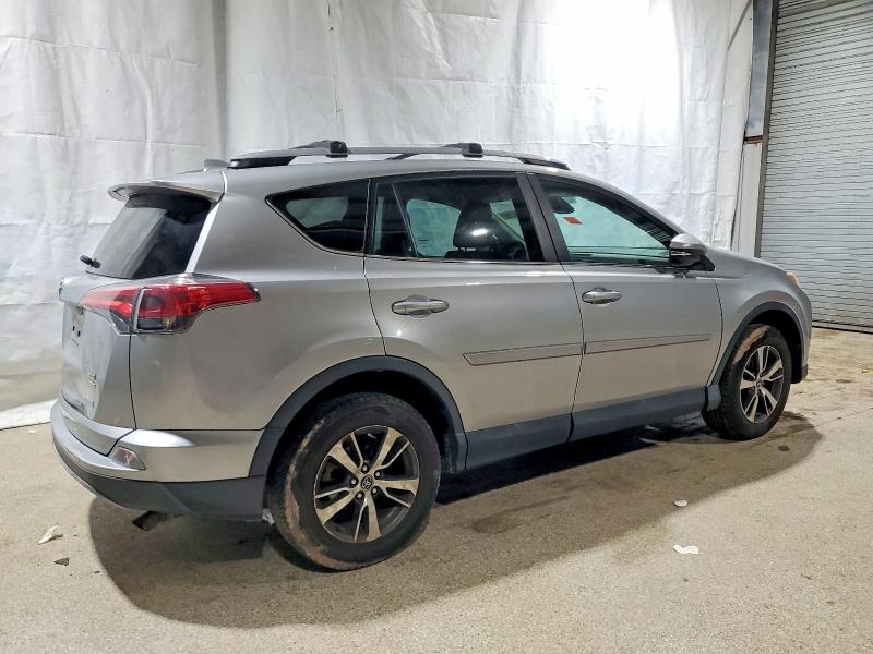 Photo 3 from auction – 2017 TOYOTA RAV4 XLE with VIN 2T3RFREV7HW552990