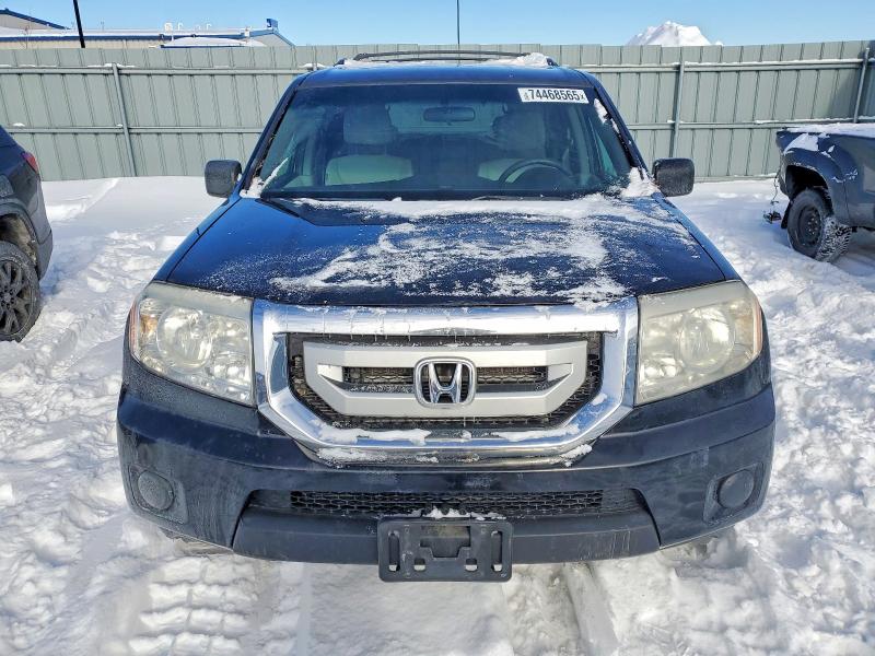 Photo 5 from auction – 2011 HONDA PILOT with VIN 5FNYF4H20BB507600