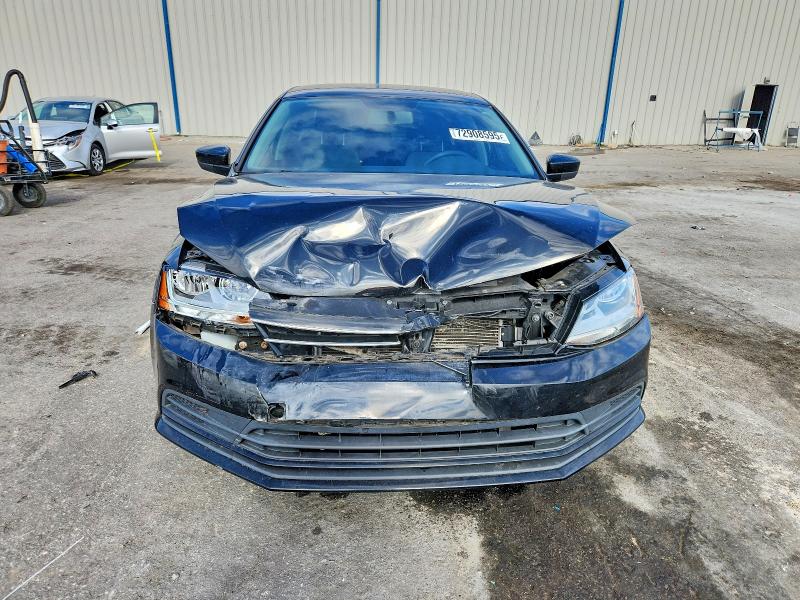 Photo 5 from auction – 2018 VOLKSWAGEN JETTA S with VIN 3VW2B7AJ3JM260696