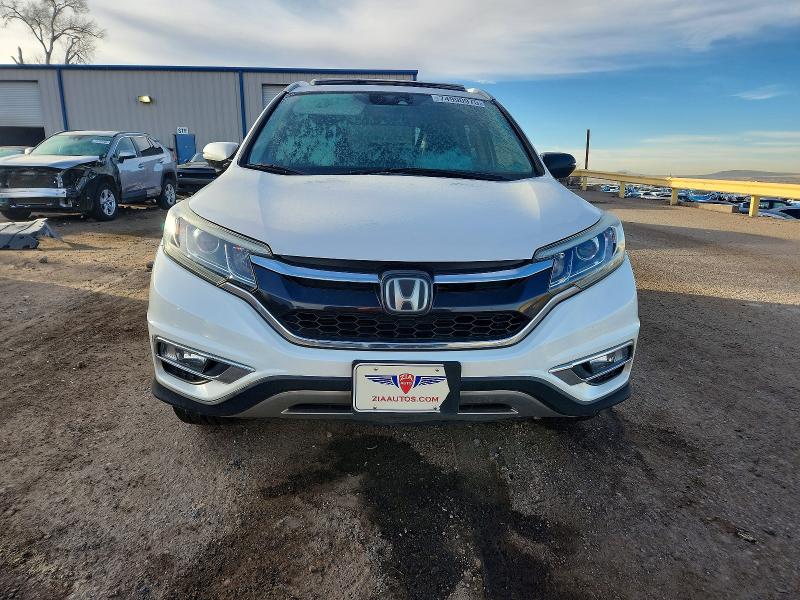 Photo 5 from auction – 2016 HONDA CR-V with VIN 5J6RM4H93GL055034