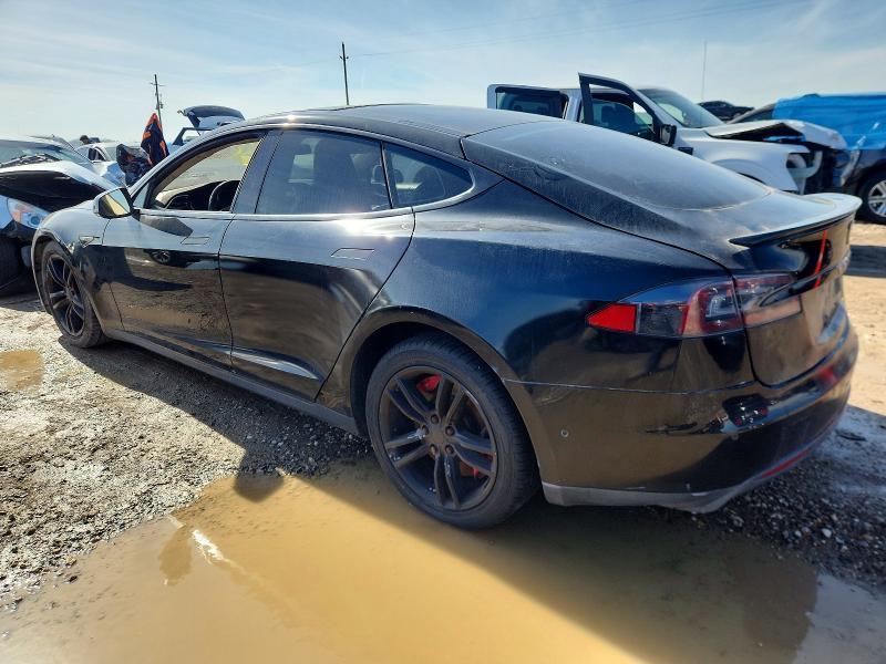 Photo 2 from auction – 2015 TESLA MODEL S 90 with VIN 5YJSA1S13FF100329
