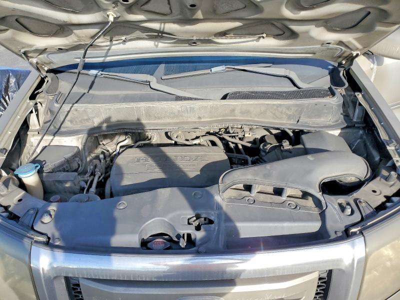 Photo 12 from auction – 2011 HONDA PILOT TOUR with VIN 5FNYF4H90BB062644