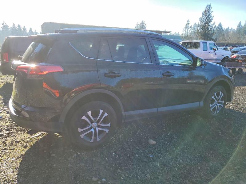 Photo 3 from auction – 2016 TOYOTA RAV4 LE with VIN 2T3BFREV8GW472792