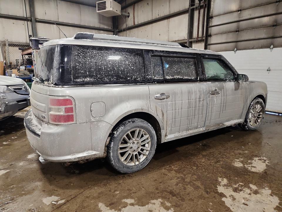 Photo 3 from auction – 2016 FORD FLEX with VIN 2FMGK5C87GBA11251