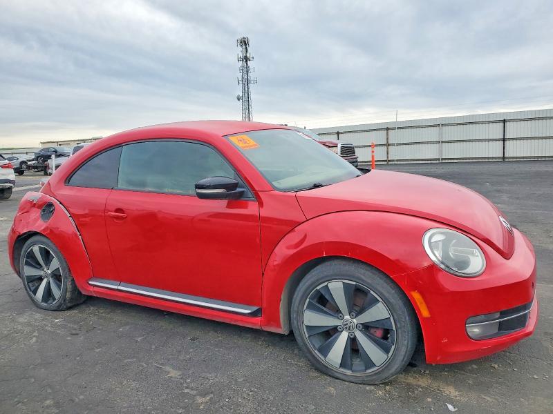 Foto 4 de la subasta – 2012 VOLKSWAGEN BEETLE con VIN 3VWVA7ATXCM607199