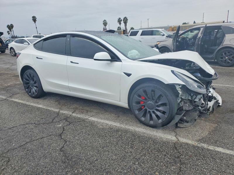 Photo 4 from auction – 2021 TESLA MODEL 3 with VIN 5YJ3E1EC4MF935939