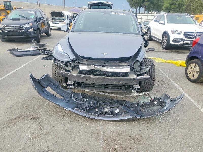 Photo 5 from auction – 2025 TESLA MODEL Y with VIN 7SAYGAEE6SF278921