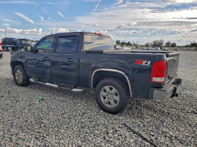 Photo 2 from auction – 2009 GMC SIERRA K15 with VIN 3GTEK13329G145402