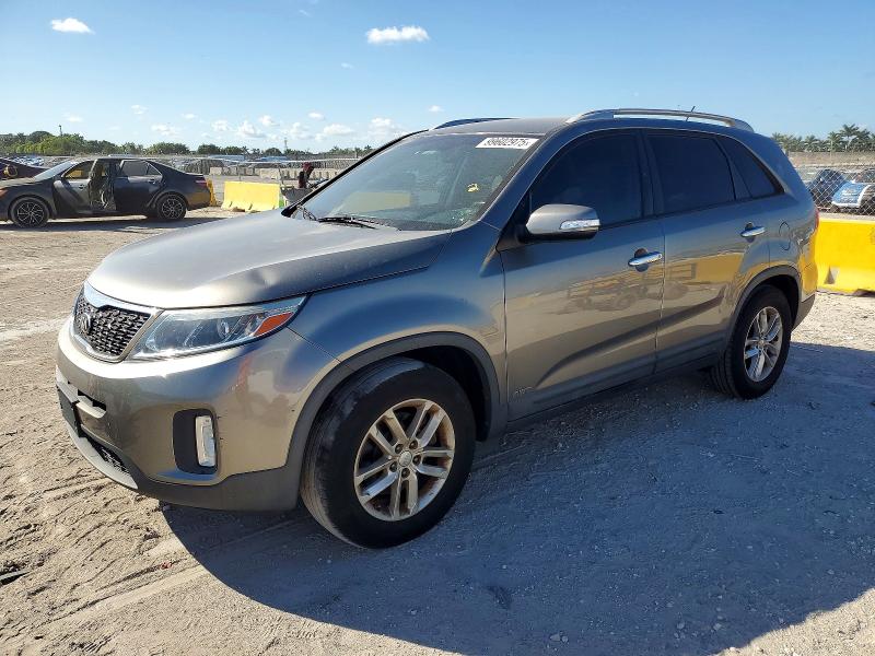 KIA SORENTO LX 2014 with VIN 5XYKTCA60EG523153 - Photo from auction