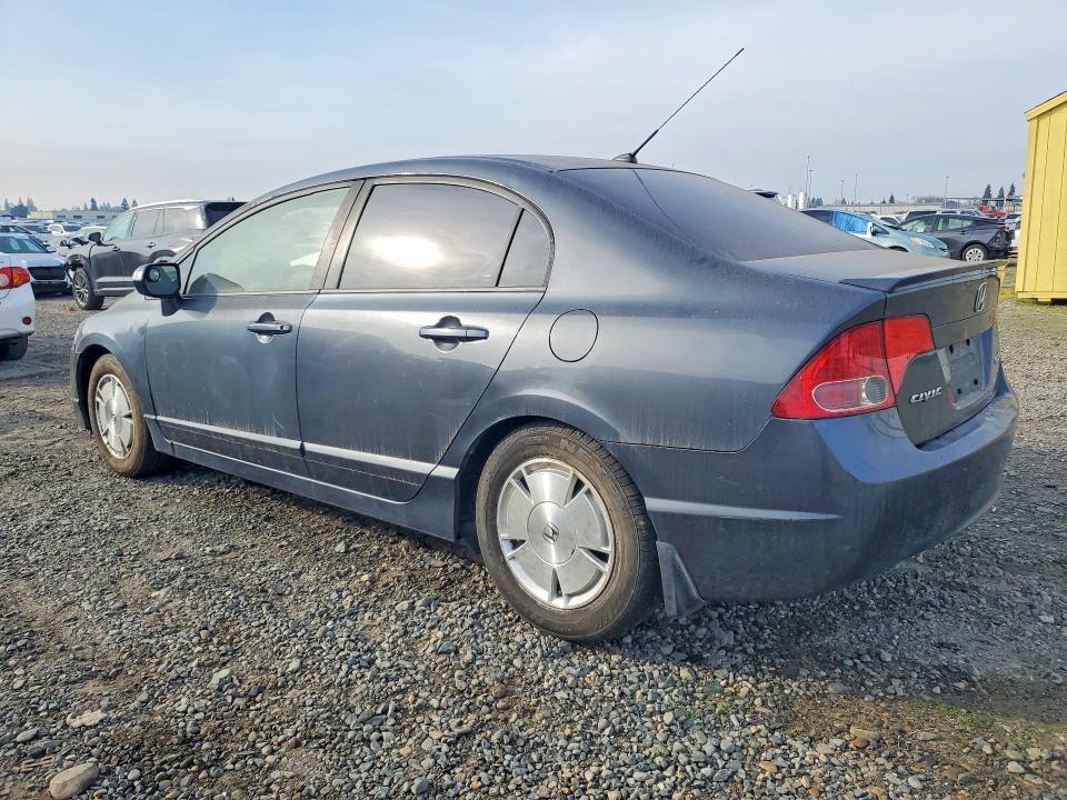 Photo 2 from auction – 2007 HONDA CIVIC HYBR with VIN JHMFA36277S019286