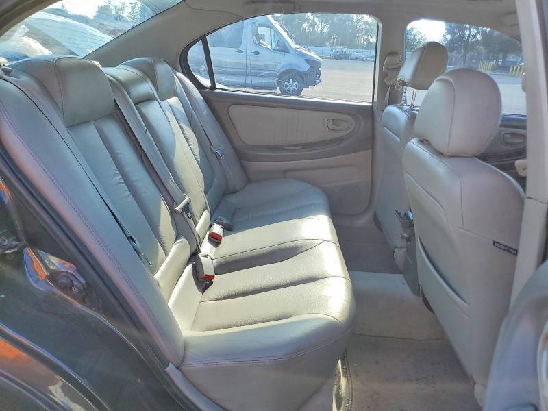 Photo 10 from auction – 2000 NISSAN MAXIMA GLE with VIN JN1CA31A3YT033879