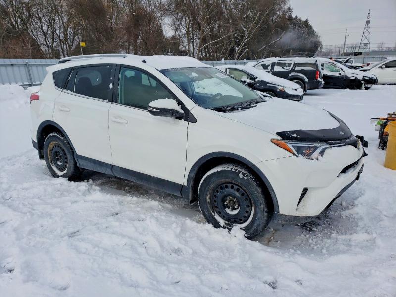 Photo 4 from auction – 2018 TOYOTA RAV4 LE with VIN 2T3ZFREV2JW507459
