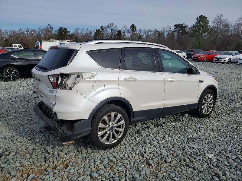 Photo 3 from auction – 2017 FORD ESCAPE TIT with VIN 1FMCU0J92HUD56318