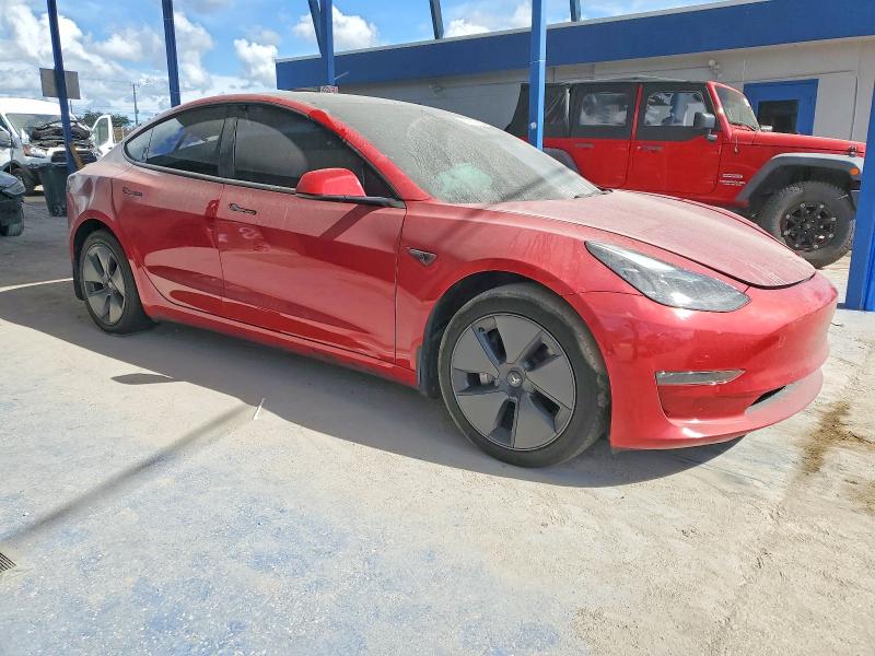 Photo 4 from auction – 2022 TESLA MODEL 3 with VIN 5YJ3E1EB5NF334449