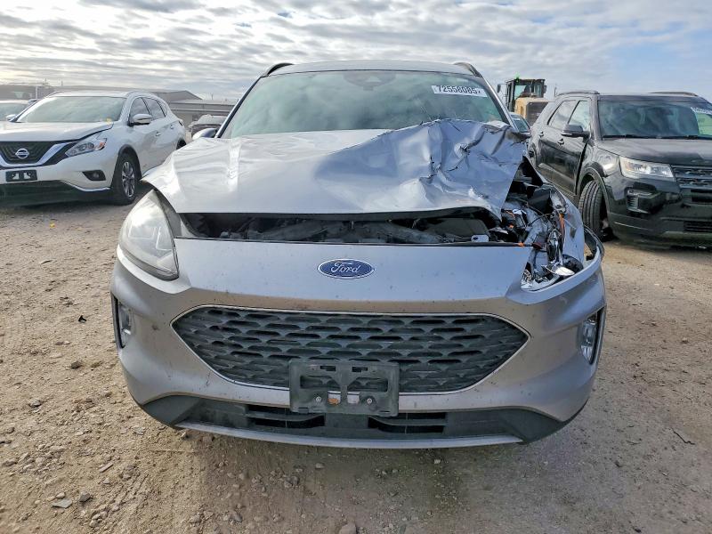 Photo 5 from auction – 2021 FORD ESCAPE with VIN 1FMCU0H63MUA36656
