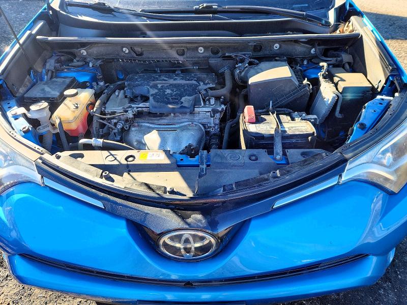 Photo 12 from auction – 2018 TOYOTA RAV4 with VIN JTMZFREV2JD115966