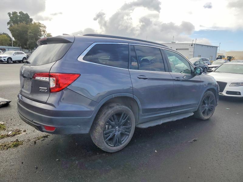 Photo 3 from auction – 2021 HONDA PILOT SE with VIN 5FNYF6H2XMB081249