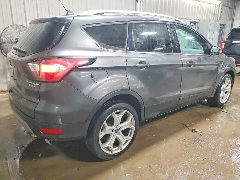 Photo 3 from auction – 2018 FORD ESCAPE with VIN 1FMCU9J98JUC55813