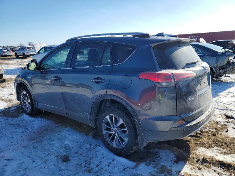 Photo 2 from auction – 2018 TOYOTA RAV4 HV LE with VIN JTMRJREV0JD191538