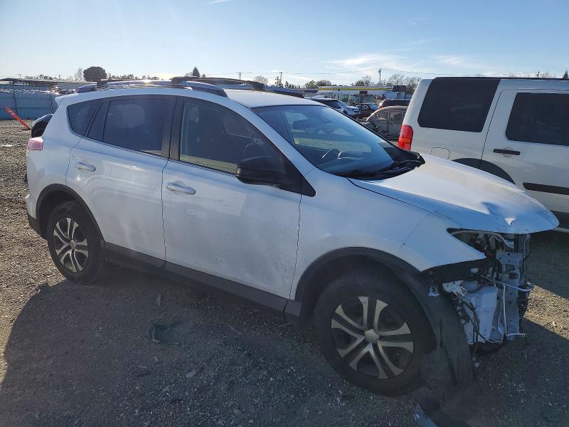 Photo 4 from auction – 2018 TOYOTA RAV4 LE with VIN JTMBFREV0JJ181497