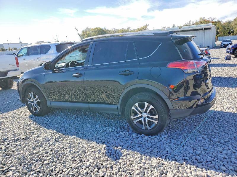 Photo 2 from auction – 2017 TOYOTA RAV4 LE with VIN 2T3ZFREV3HW343732