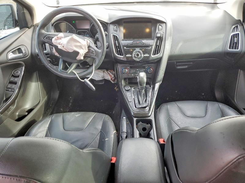 Photo 8 from auction – 2016 FORD FOCUS TITA with VIN 1FADP3N23GL359608