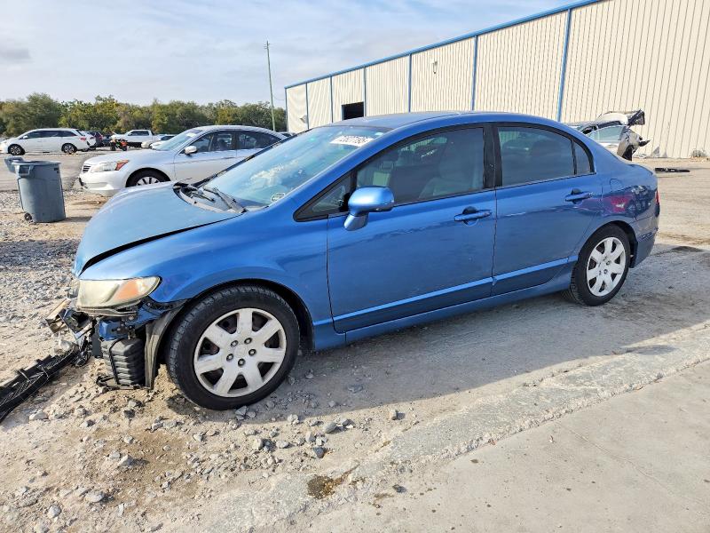 HONDA CIVIC LX 2011 with VIN 19XFA1F54BE028264 - Photo from auction