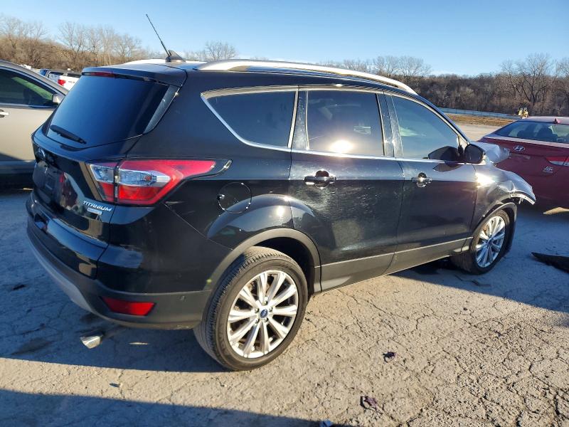Photo 3 from auction – 2018 FORD ESCAPE TIT with VIN 1FMCU0J96JUC62500