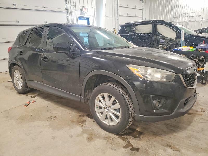 Photo 4 from auction – 2014 MAZDA CX-5 with VIN JM3KE2CY6E0304164