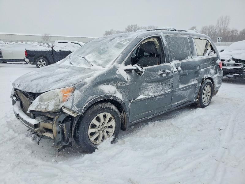 HONDA ODYSSEY 2010 with VIN 5FNRL3H69AB013700 - Photo from auction