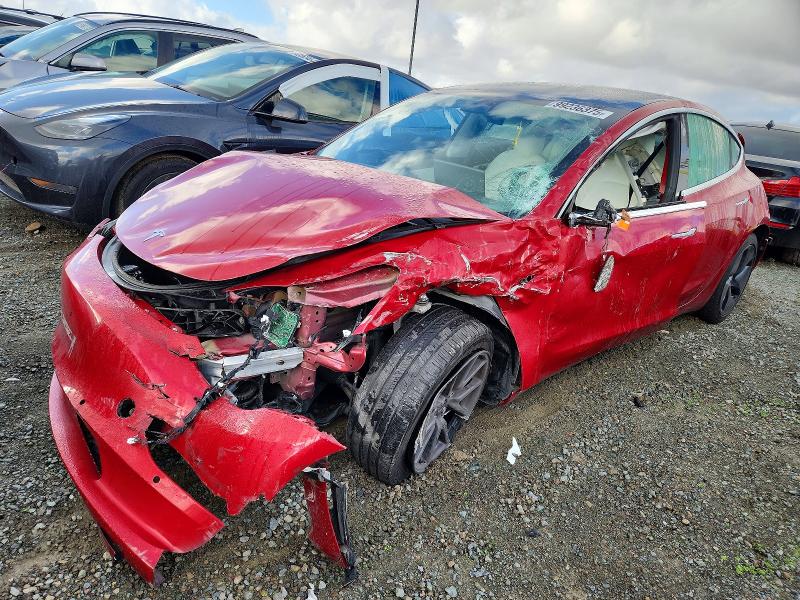 TESLA MODEL 3 2019 with VIN 5YJ3E1EA5KF402767 - Photo from auction